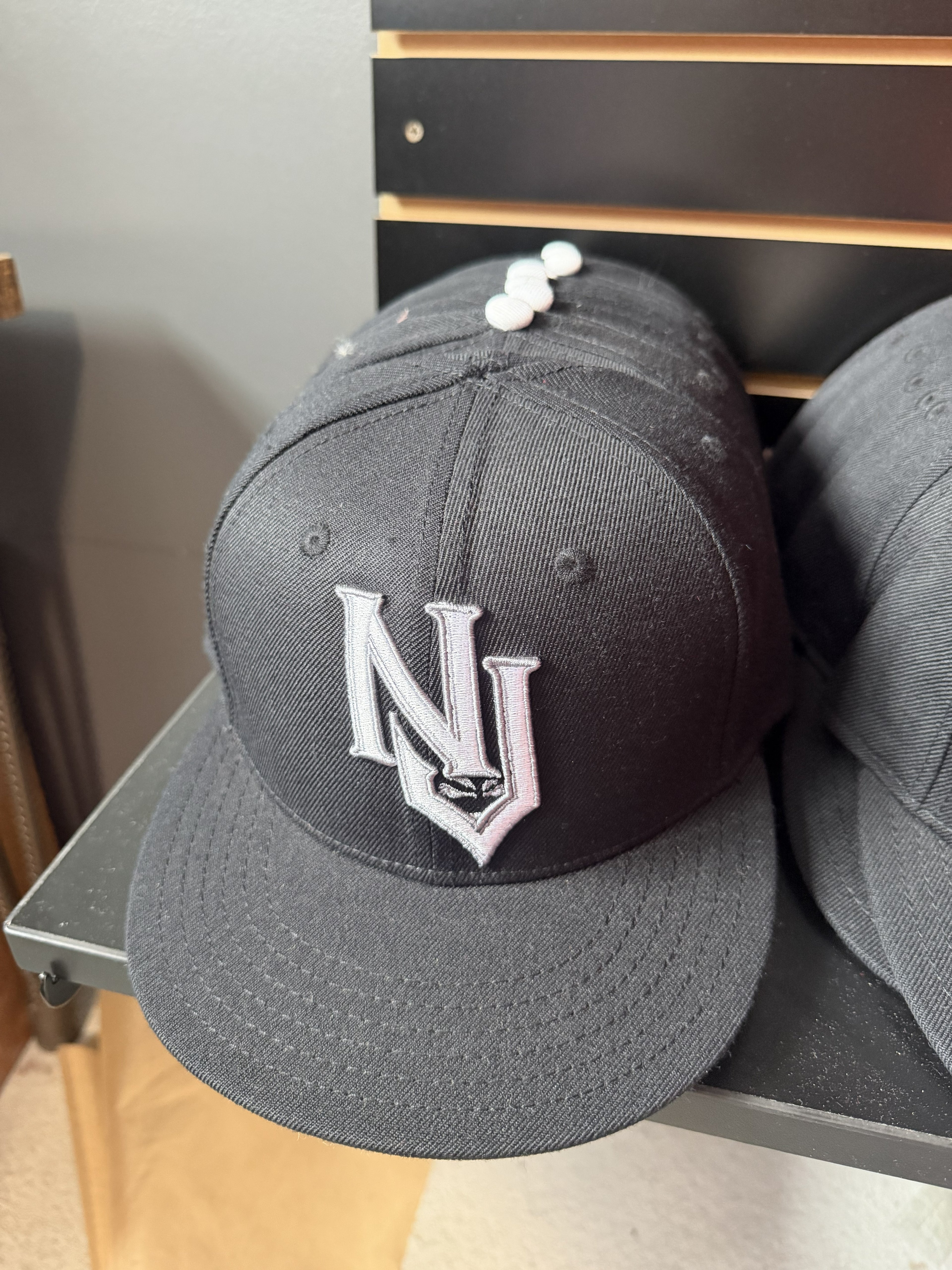 Jackals Black NJ Hat Grey NJ Writing